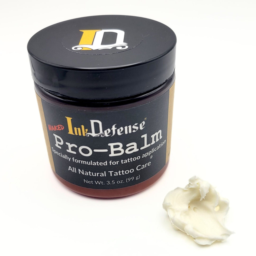 Pro-Balm for Tattoo Artists Natural with product outside of container - Ink Defense